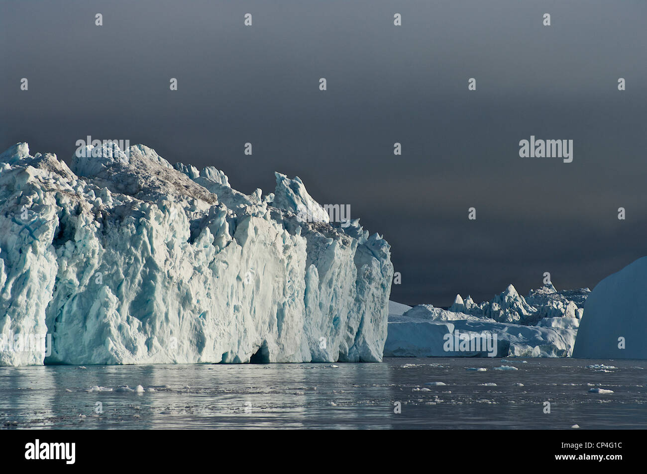 Greenland - West Coast - Qaasuitsup Kommunia - Ilulissat. Icebergs calving from glacier Sermeq Kujalleq. Stock Photo