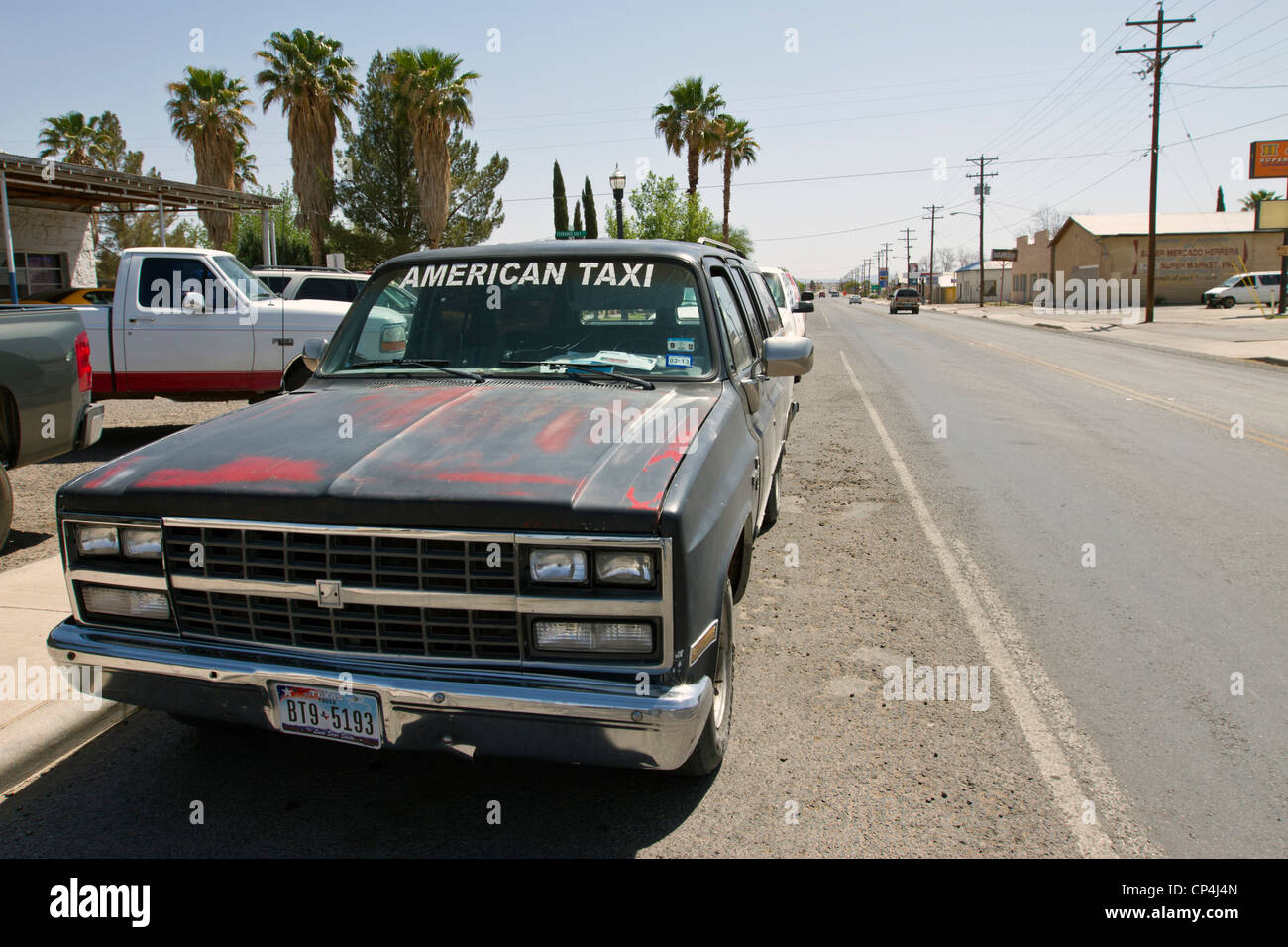 Old Chevrolet Suburban car used as a taxi in the border town of Presidio, Texas. Stock Photo