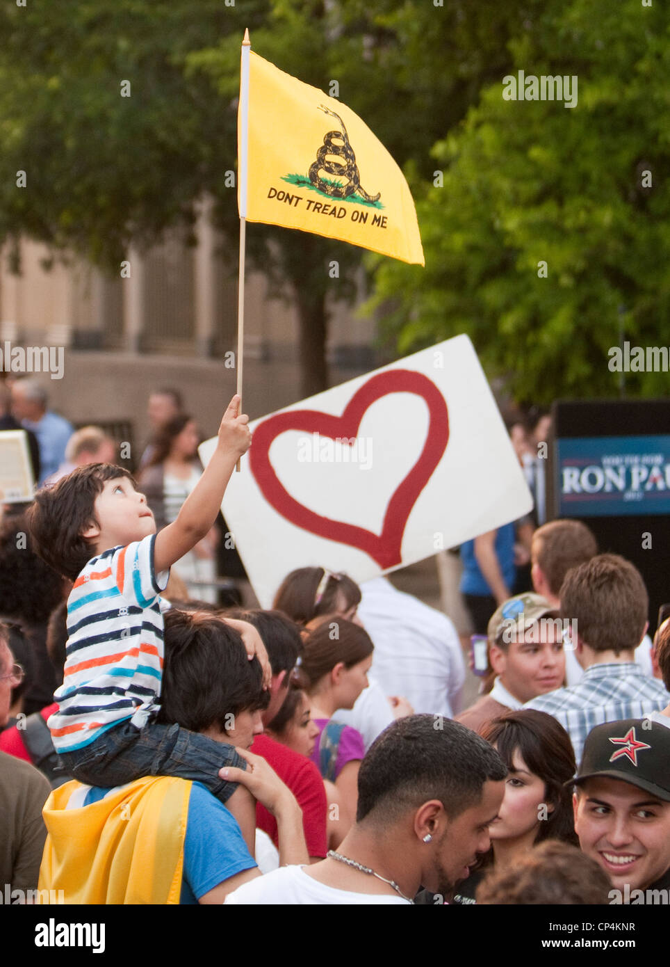 young boy holds Don't Tread on Me flag at Ron Paul rally in San Antonio, Texas Stock Photo
