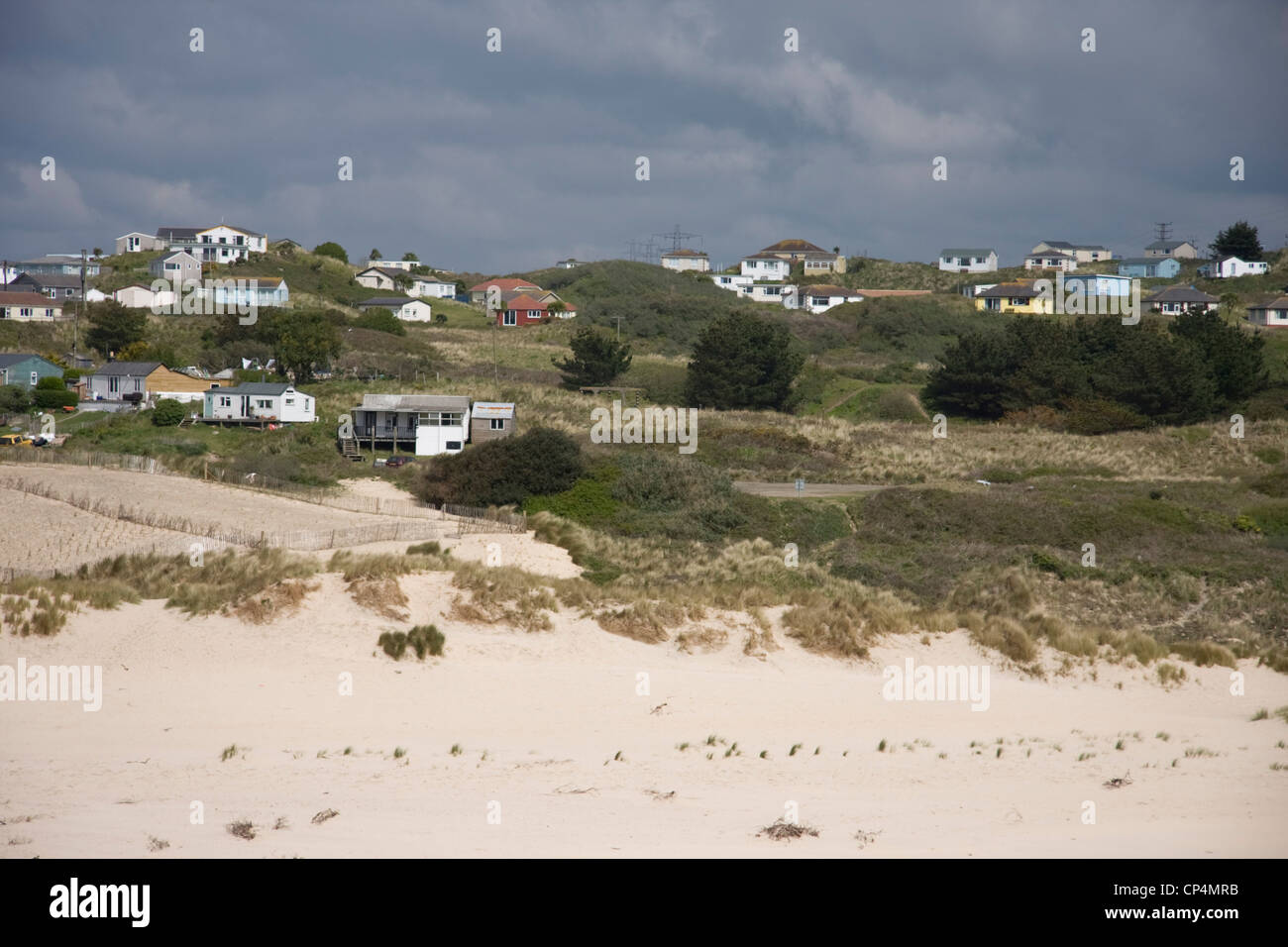 1930s holiday chalets in the sand dunes at Hayle Towans, Cornwall Stock