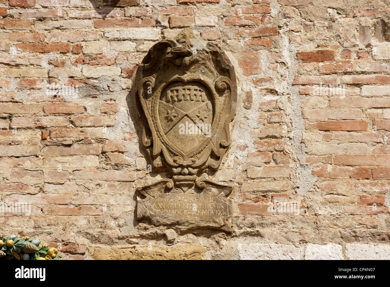 Detail of a coat of arms of the Pretorian Palace or Podesta's Palace. Italy, Tuscany Region, Colle Val d'Elsa (Si). Stock Photo
