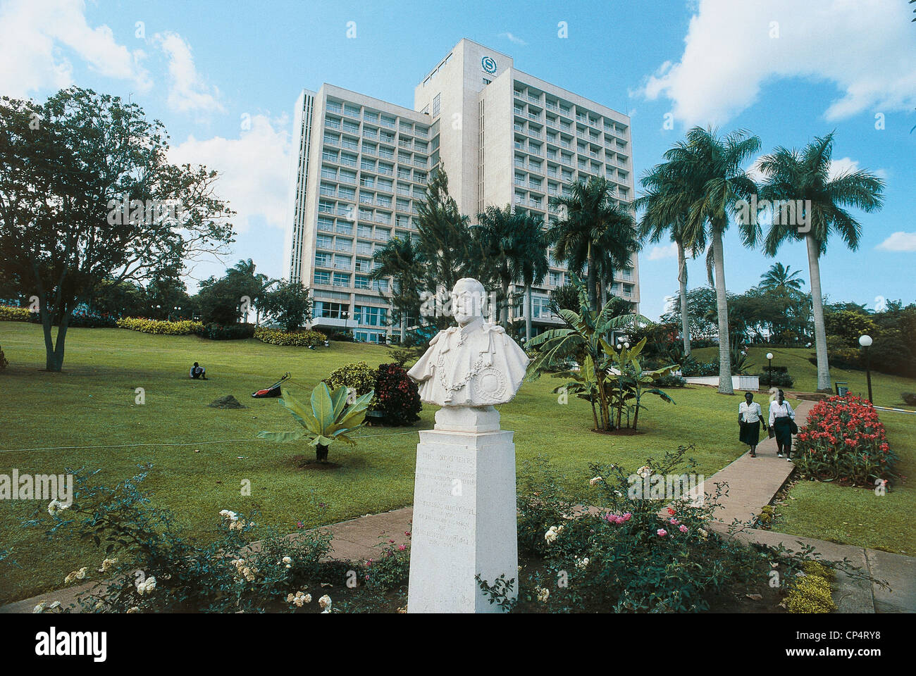 Uganda Kampala. Jubilee Park, a bust of V, the Sheraton hotel