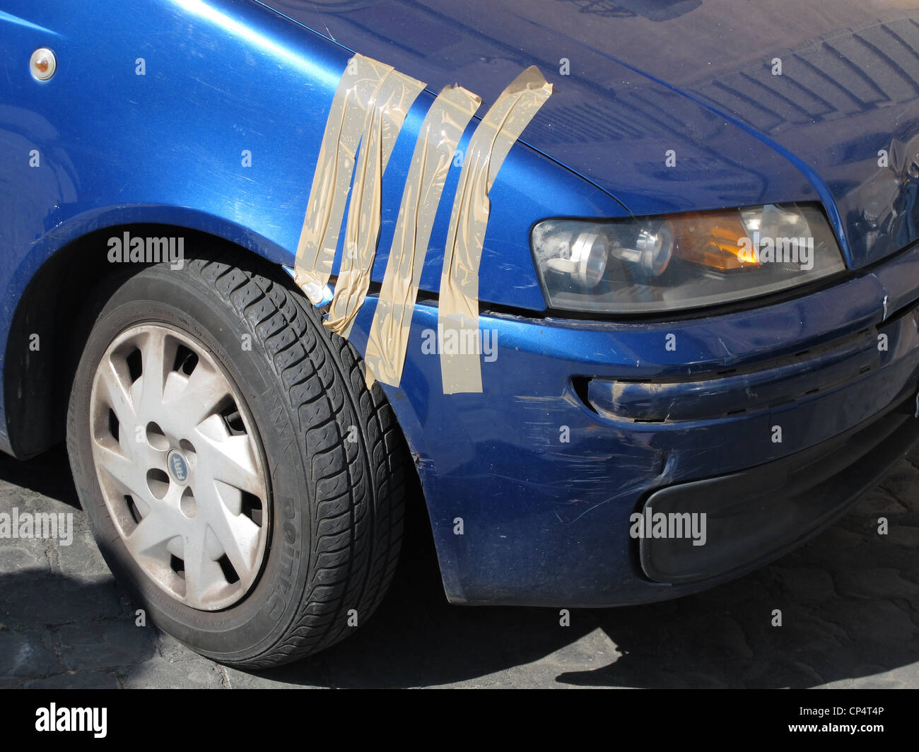 temporary repair for broken car front wing bumper Stock Photo Alamy