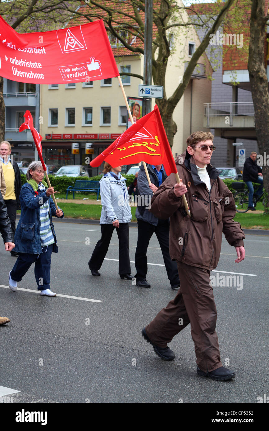 Single Demonstrant with red IG Metall Flag. Stock Photo