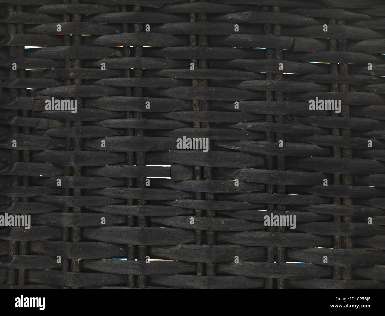 A cane basket isolated against a white background Stock Photo