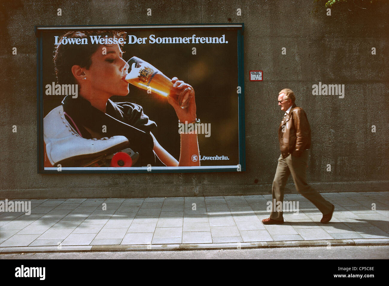 Germany - Monaco. Lowenbrau beer billboard in a street Stock Photo