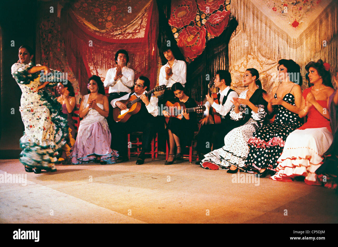 Spain - Madrid. Cafe de Chinitas. Group of flamenco gypsies clothes. Stock Photo