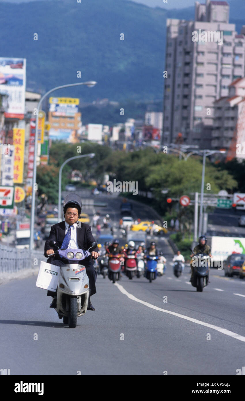Taiwan Taipei Traffic Man On Scooter In Business Suit One Of The Stock Photo Alamy