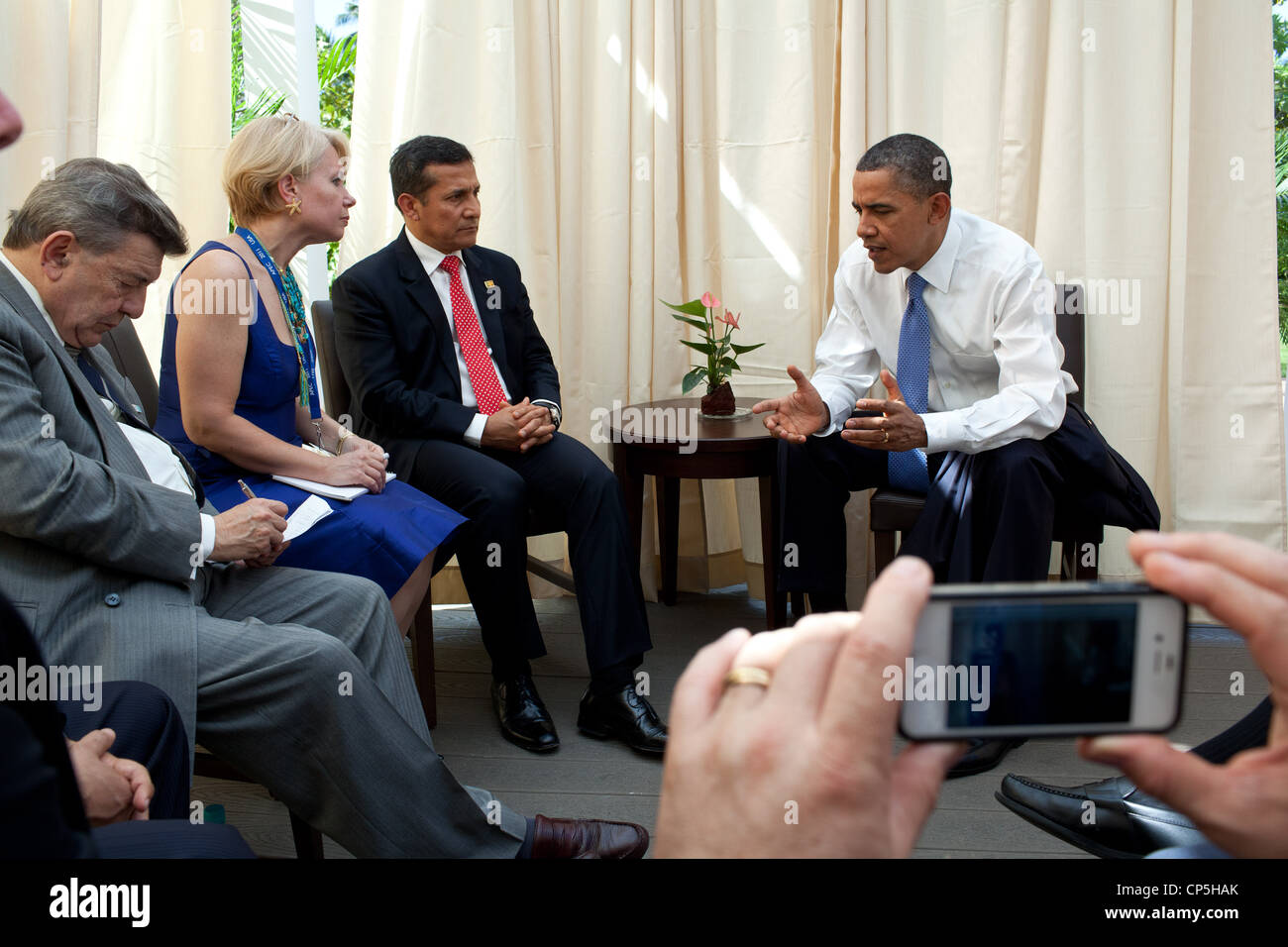 President Barack Obama meets with President Ollanta Humala of Peru during the APEC summit in Honolulu, Hawaii, Sunday, Nov. 13, Stock Photo