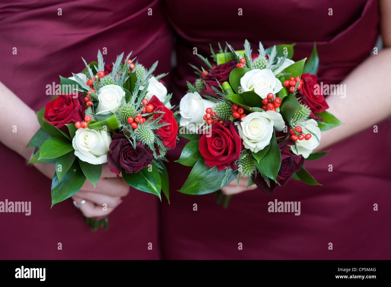 bridesmaids holding bouquet of flowers at a wedding Stock Photo - Alamy