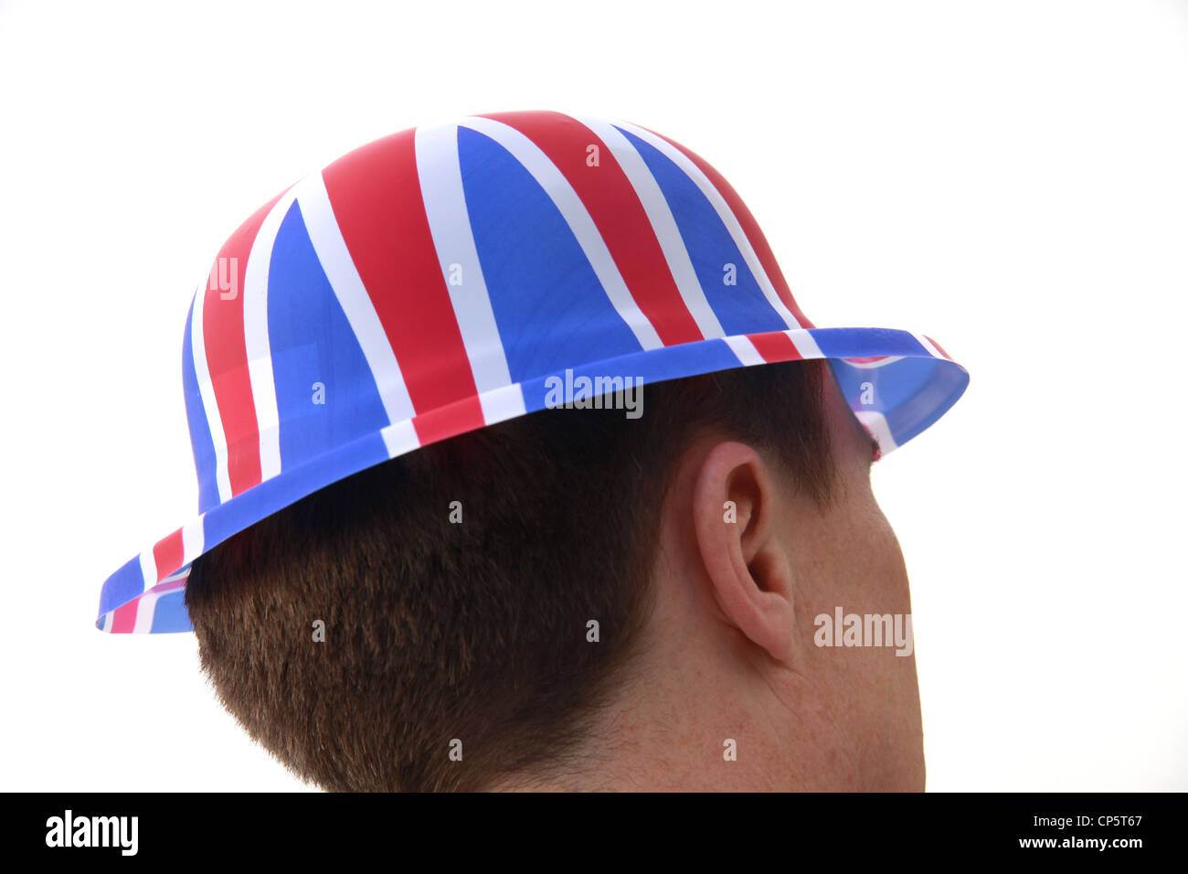 dressing up in a plastic united kingdom flag hat Stock Photo