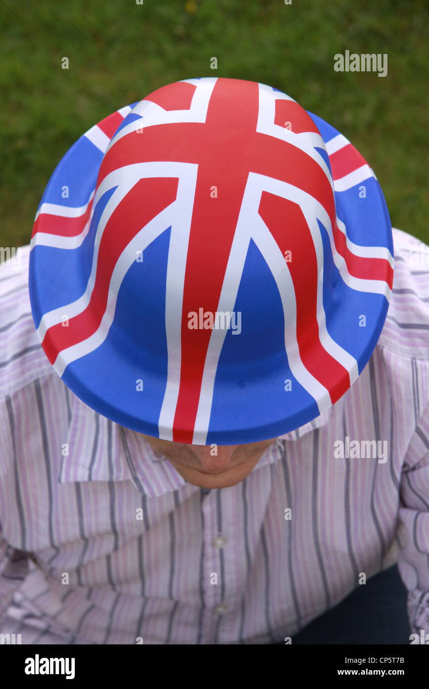dressing up in a plastic united kingdom flag hat Stock Photo