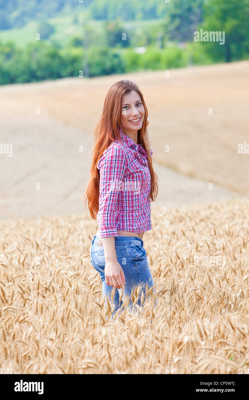 woman in a field of wheat Stock Photo - Alamy