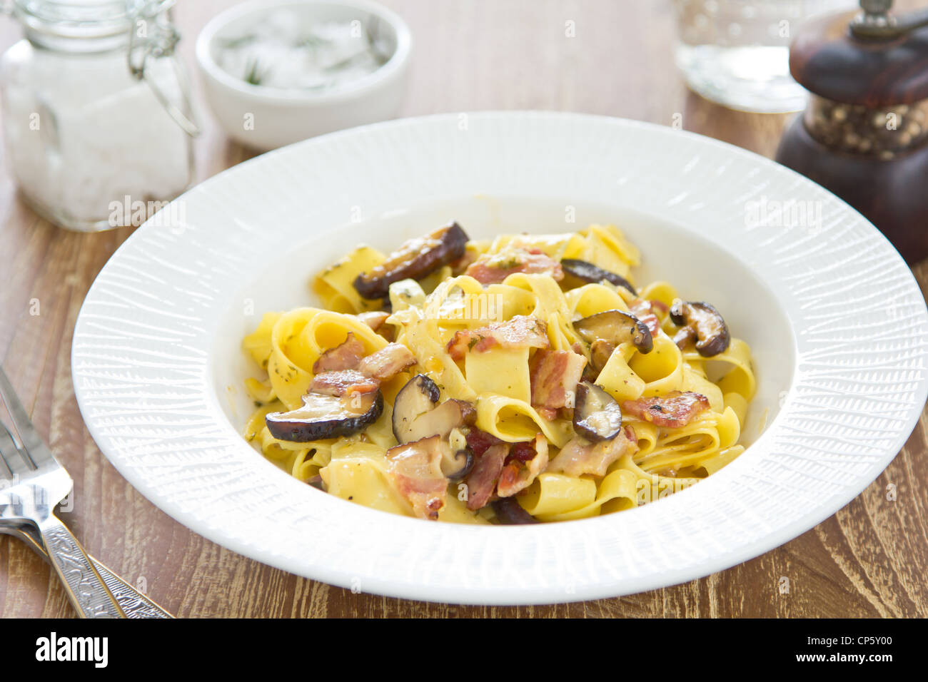 Fettuccine Carbonara with bacon and mushroom Stock Photo Alamy
