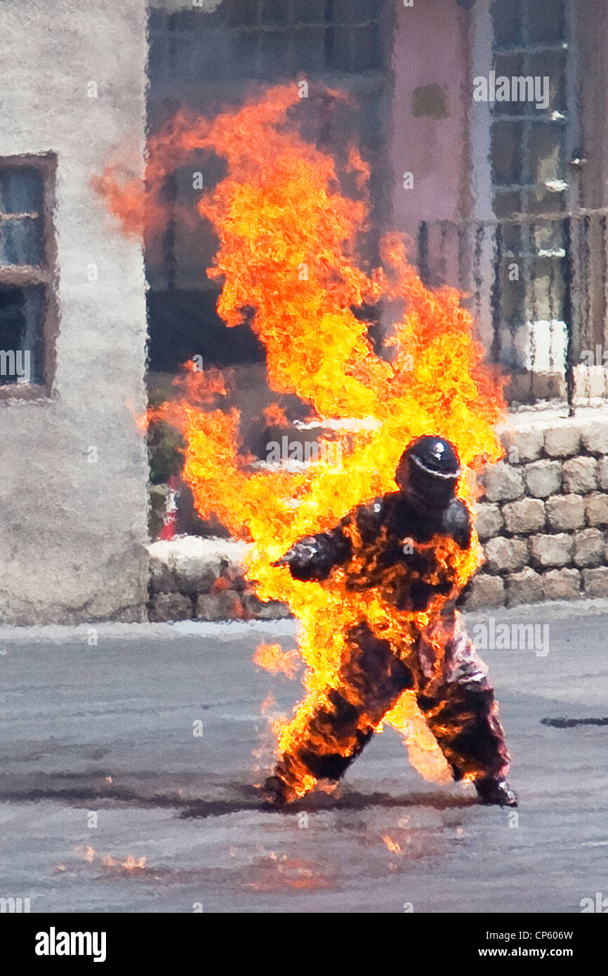Man on fire stunt at Action, lights, motors show, Hollywood Studios. Stock Photo