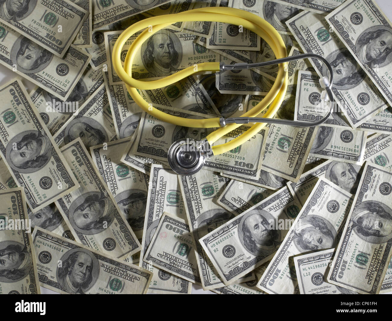 Health Care Medical Costs: Stethoscope and Pile Of Money, USA Stock Photo