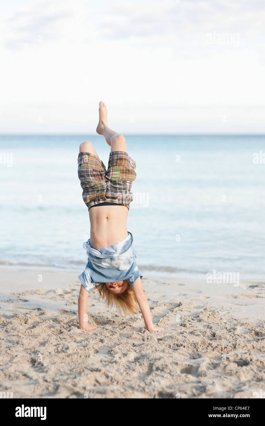 Spain, Mallorca, Boy playing on beach Stock Photo