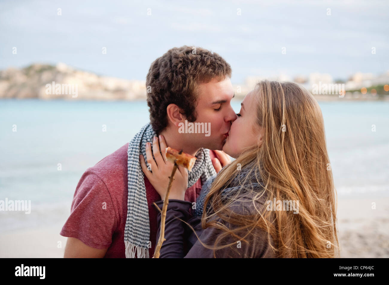 Spain, Mallorca, Couple kissing on beach Stock Photo