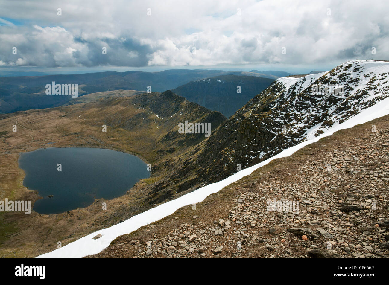 Red Tarn and Striding Edge from the top of Helvellyn, Lake District, Cumbria, UK Stock Photo