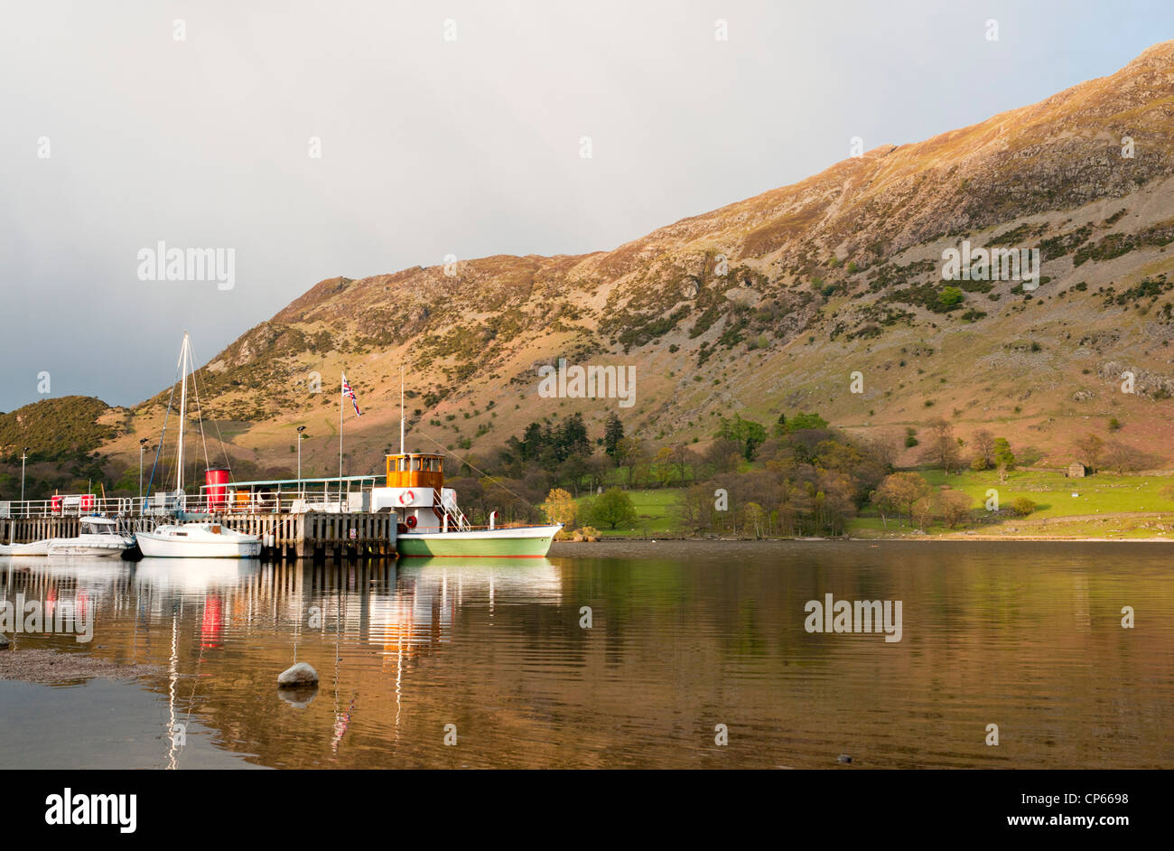 Boats moored at Glenridding Pier for the evening, Ullswater, Lake District, Cumbria, UK Stock Photo
