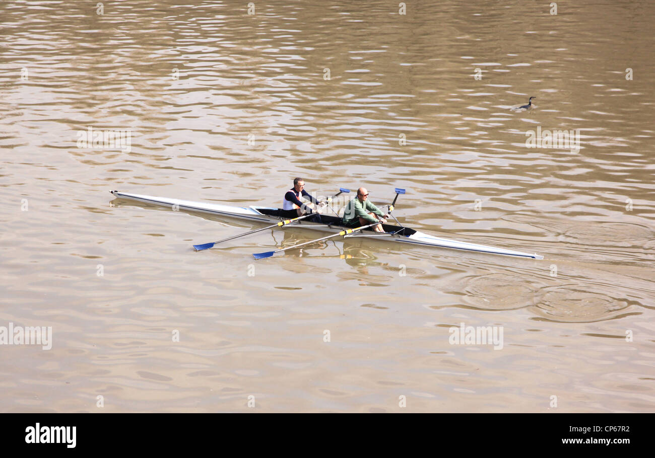 Two people canoeing on the Po River in Turin, Italy Stock Photo
