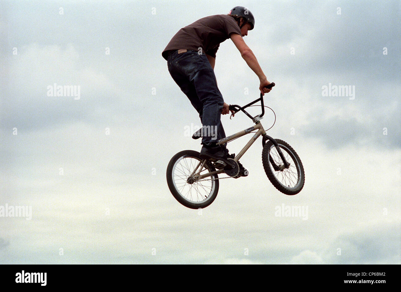 A rider does a trick on his BMX bike Stock Photo - Alamy