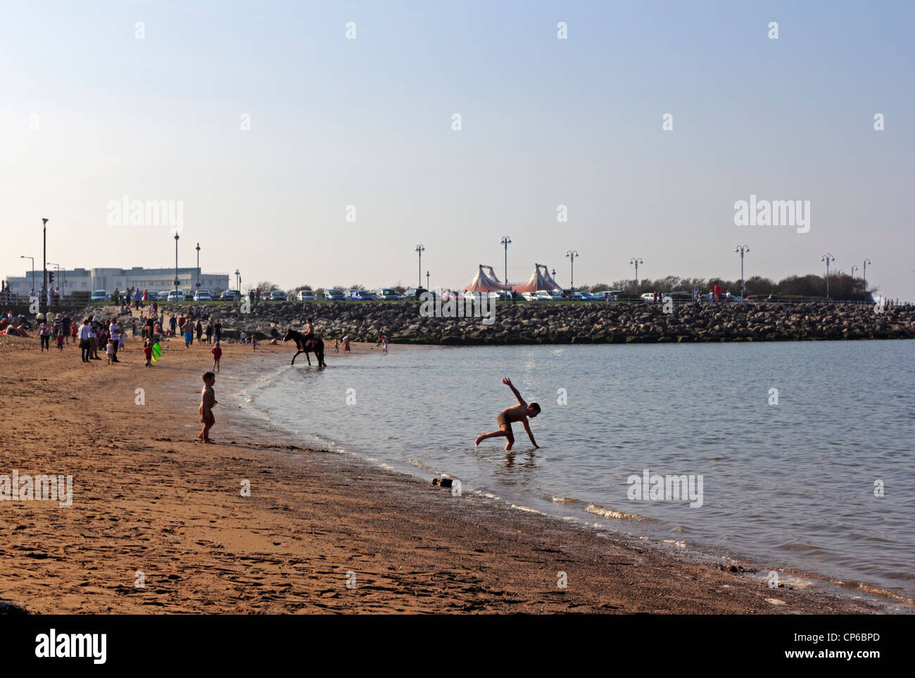 Children playing on the beach at Morecambe, Lancashire. Stock Photo