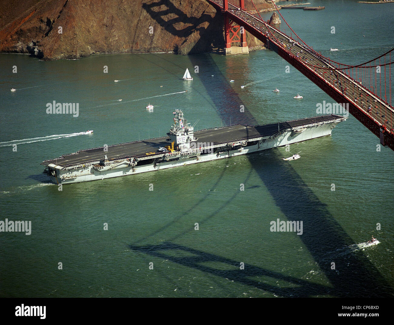 USS Enterprise (CVN-65) passing under the Golden Gate Bridge during Fleet Week activities. Stock Photo