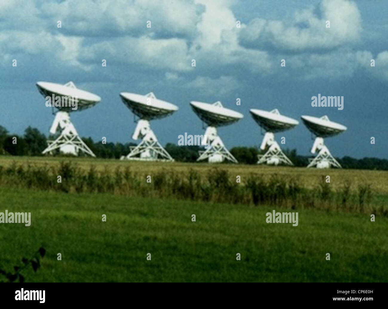 Radio telescope antennas used first for the Ryle Telescope, and later for the Arcminute Microkelvin Imager, located at Mullard Radio Astronomy Observatory in Cambridgeshire. Stock Photo