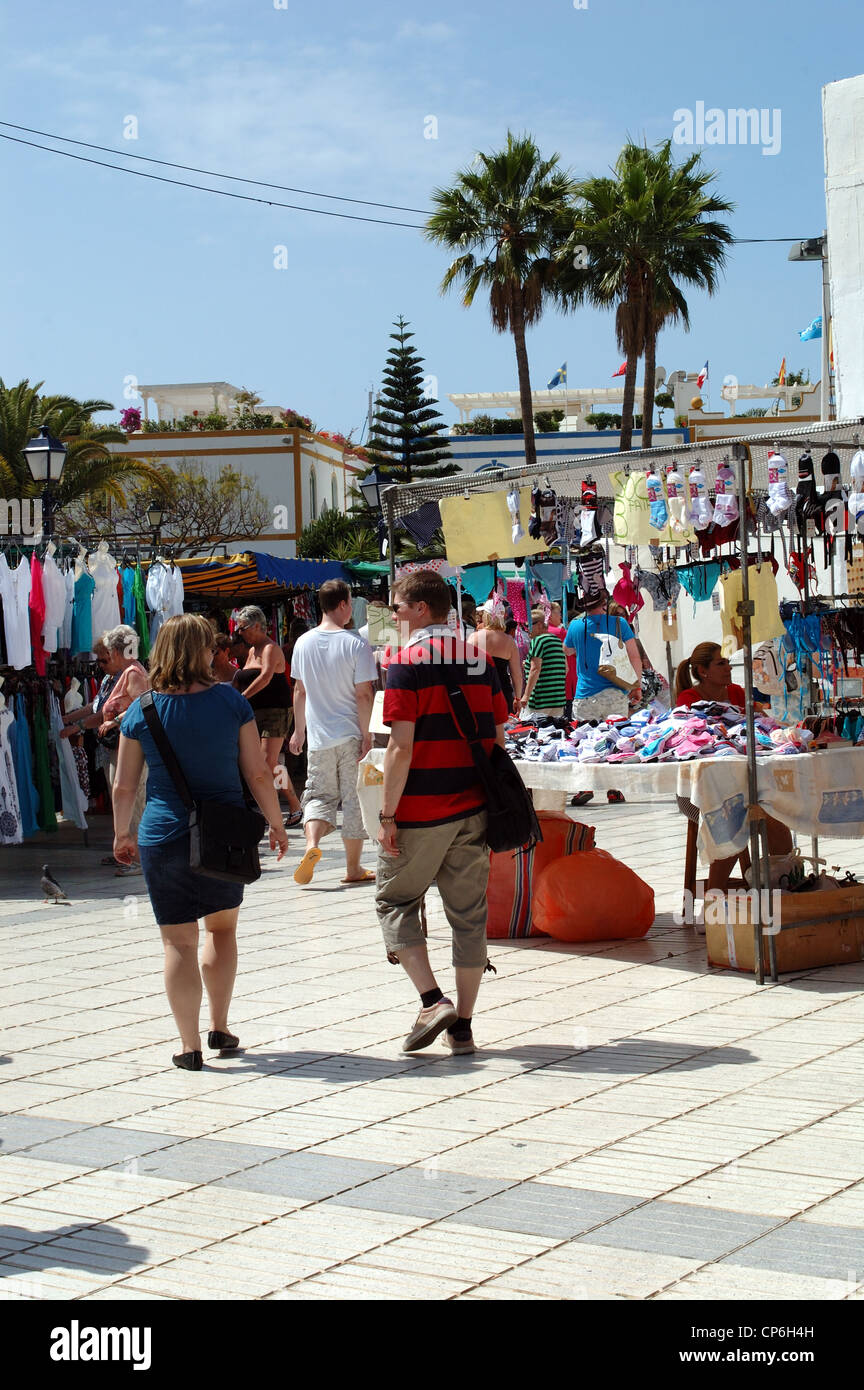 Shoppers in the market at Puerto Mogan, Gran Canaria, Canary Islands
