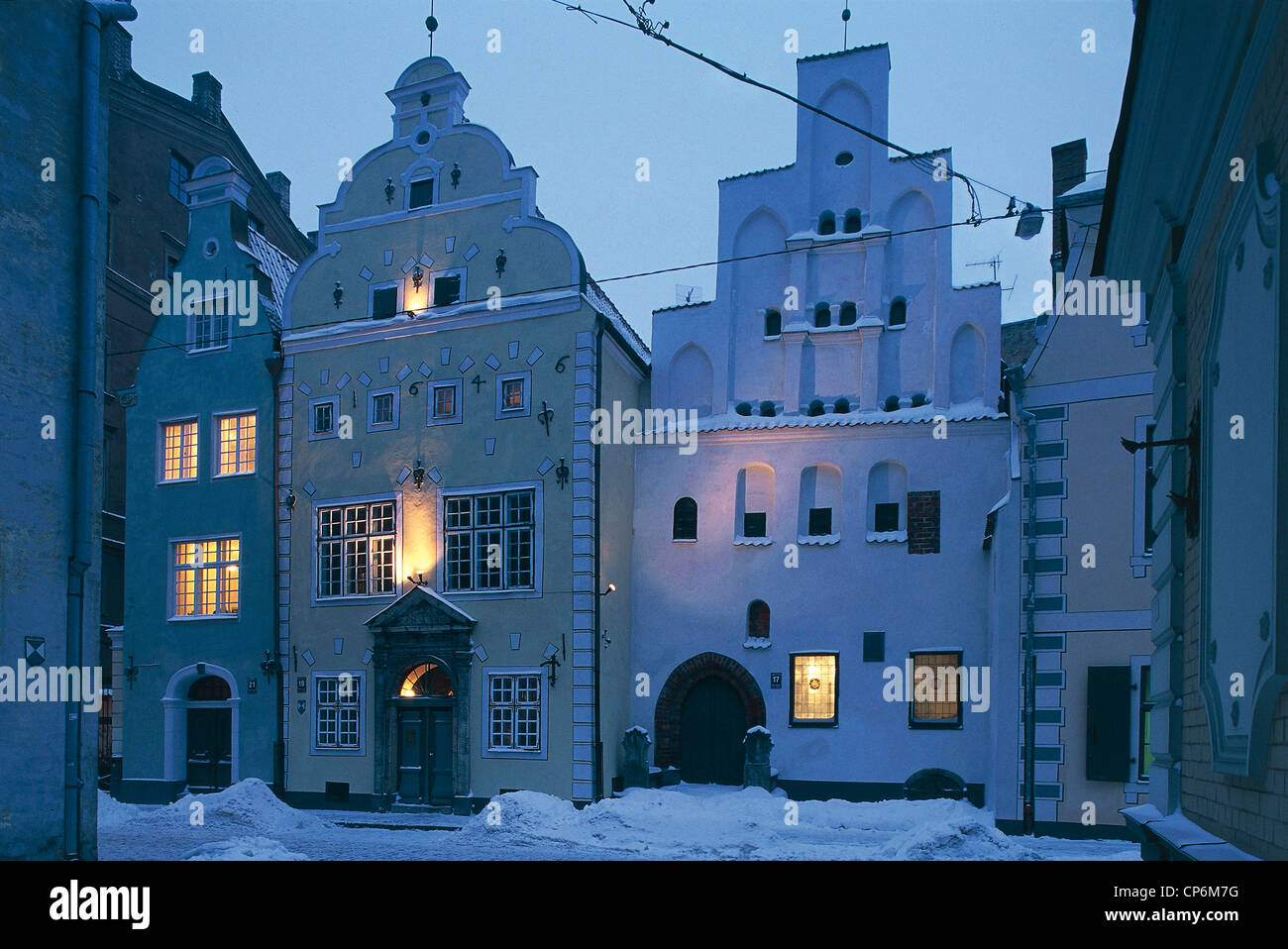 Latvia Riga Old Town (Vecriga; UNESCO Heritage 1997). buildings known as Three Brothers (Tris bral, XV century). Snow. first Stock Photo
