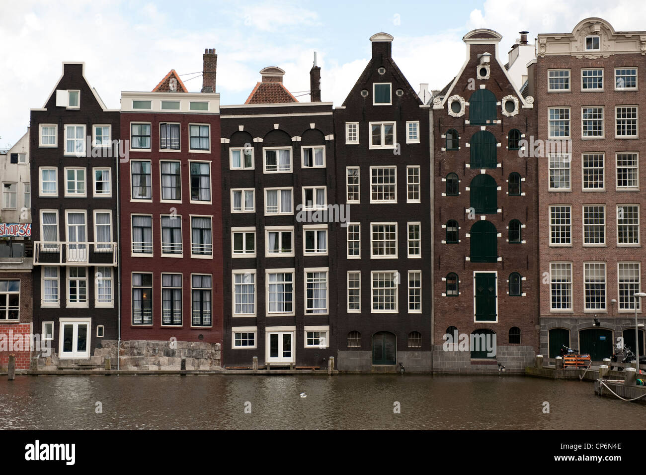 Traditional canalside houses Amsterdam Holland Netherlands Europe EU Stock Photo