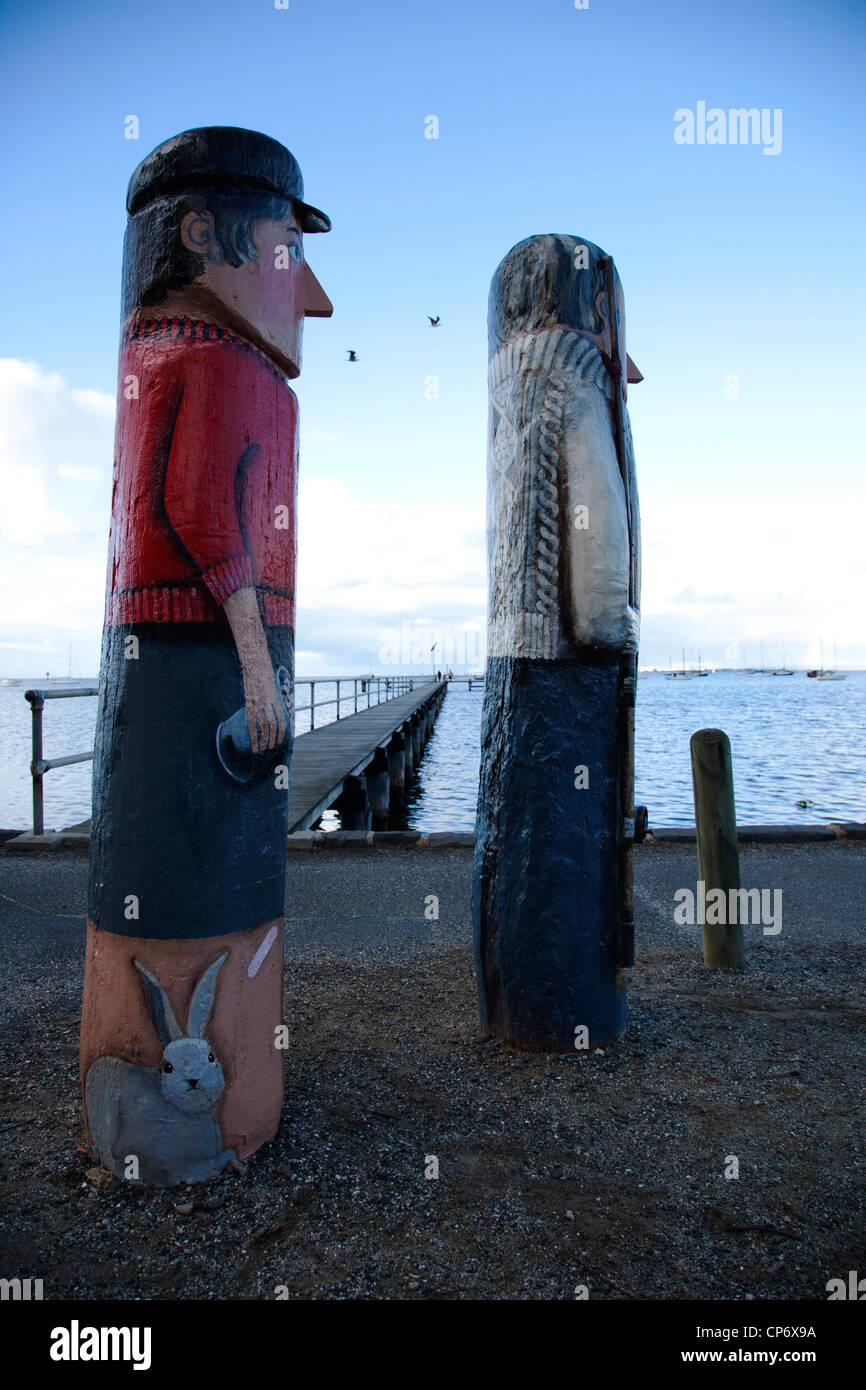 2 painted statue by the sea with blue sky in background at Geelong