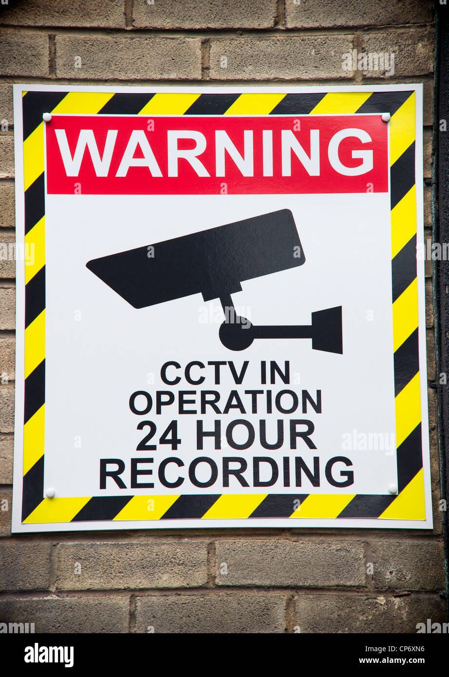 warning sign of close circuit television cameras at business premises Stock Photo