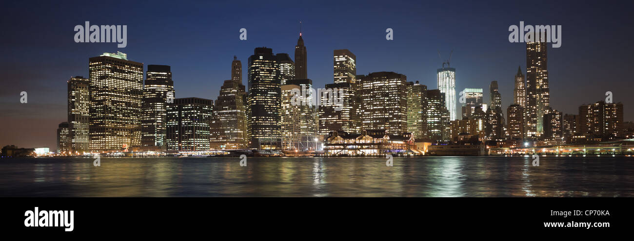 The New York City skyline at twilight w the Freedom tower Stock Photo ...