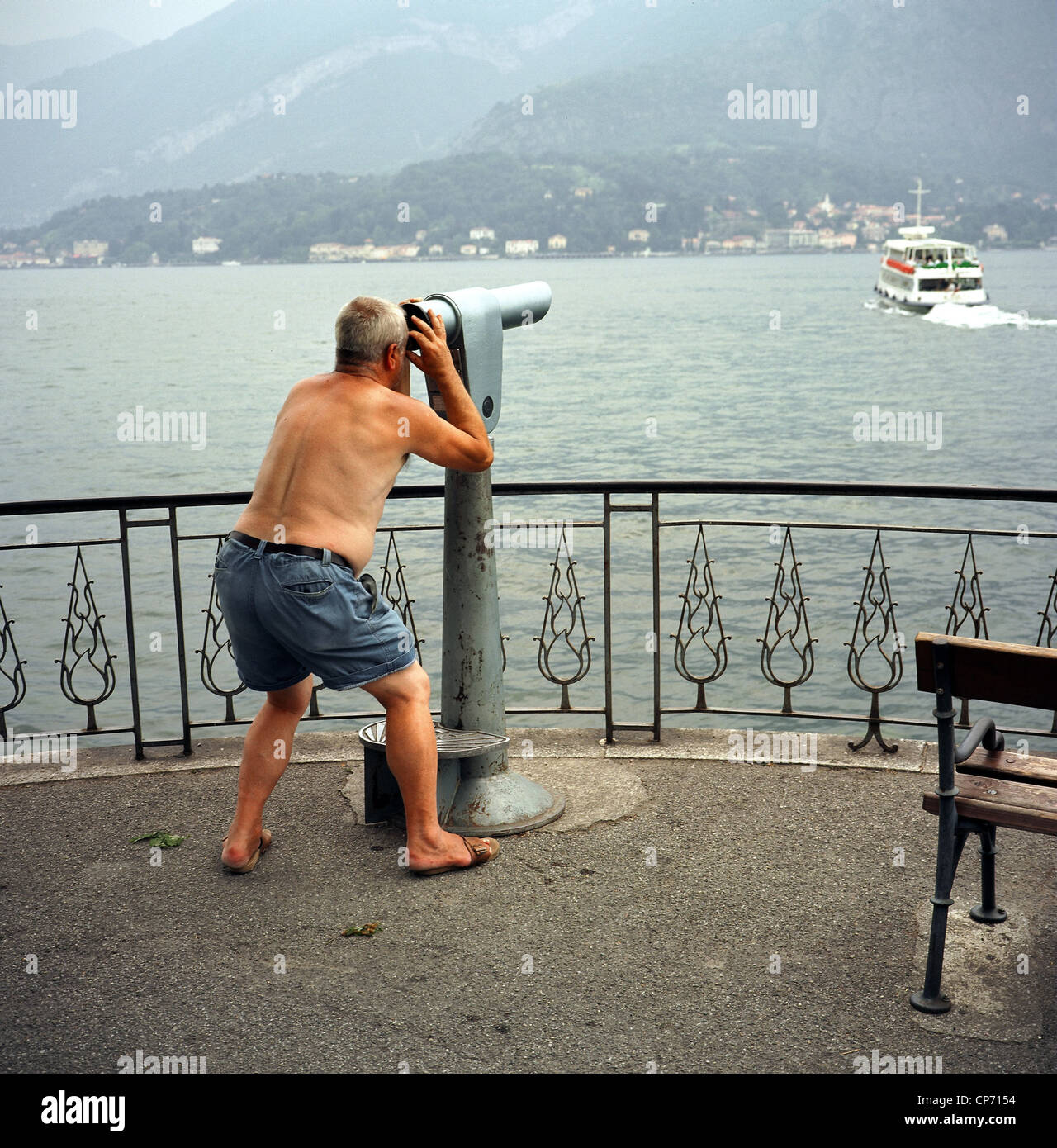 An elderly man on a vantage point at Lake Como, Italy Stock Photo