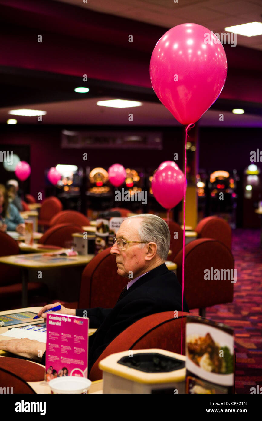 Customer at Mecca Bingo Hall, London Stock Photo