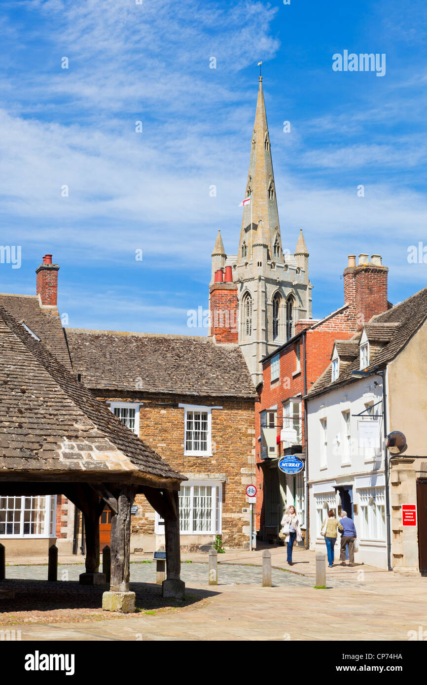 Oakham town Buttercross Market square and spire of All Saints Church  Rutland England UK GB EU Europe Stock Photo