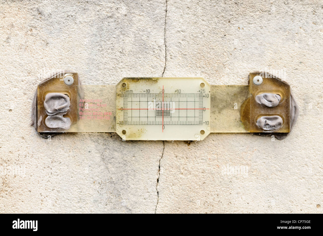 Avongard Tell-Tale crack monitoring gauge installed to measure movement of a wall crack Stock Photo