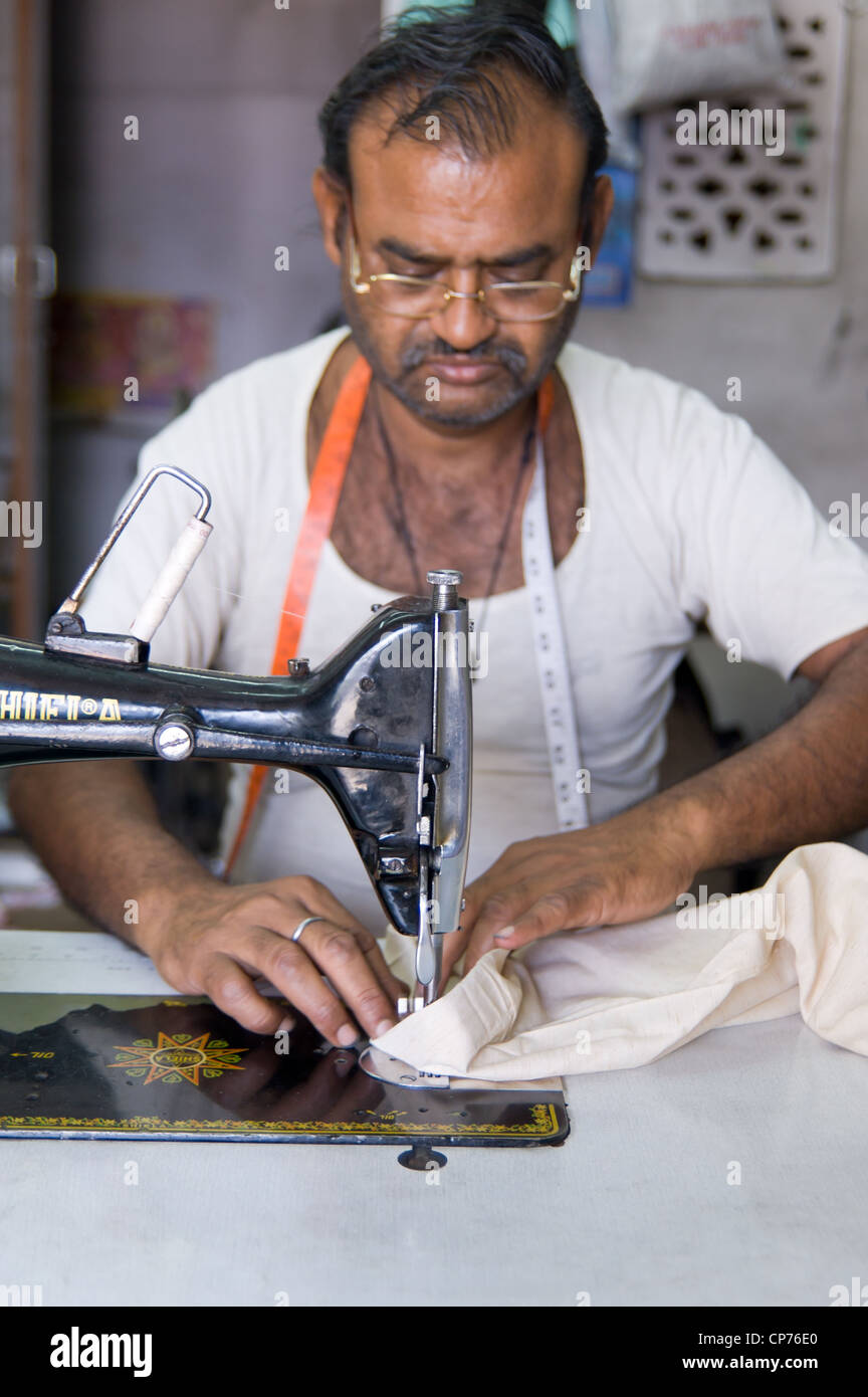 A tailor sews clothing in Jodhpur, India Stock Photo Alamy