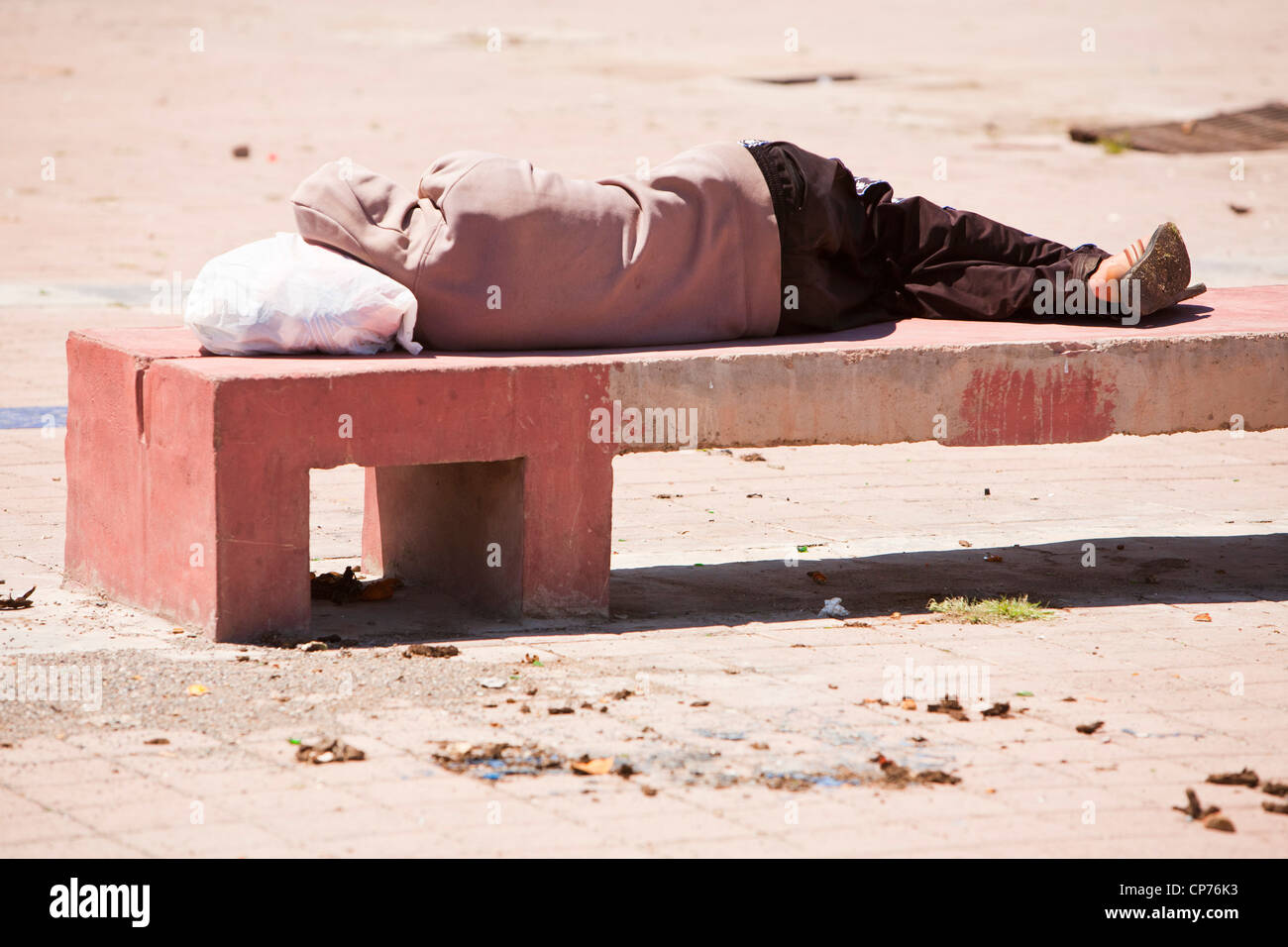 Rough sleeper park bench hi-res stock photography and images - Alamy