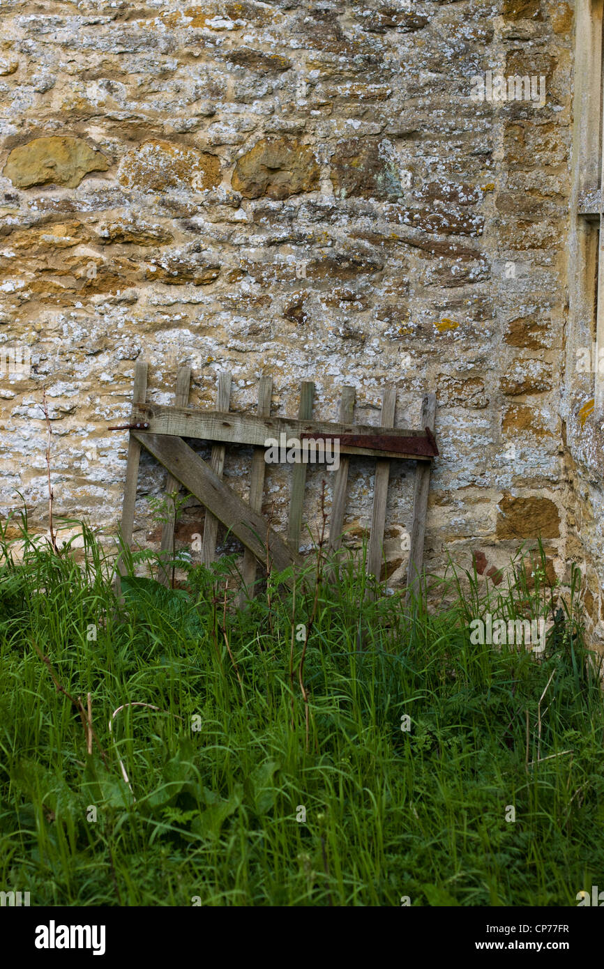 old wooden gate on a building in the British countryside Heart of