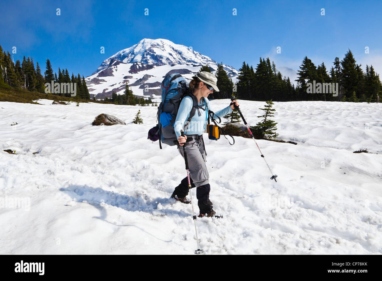 A woman hiking in Spray Park, Mount Rainier National Park, Washington, USA. Stock Photo