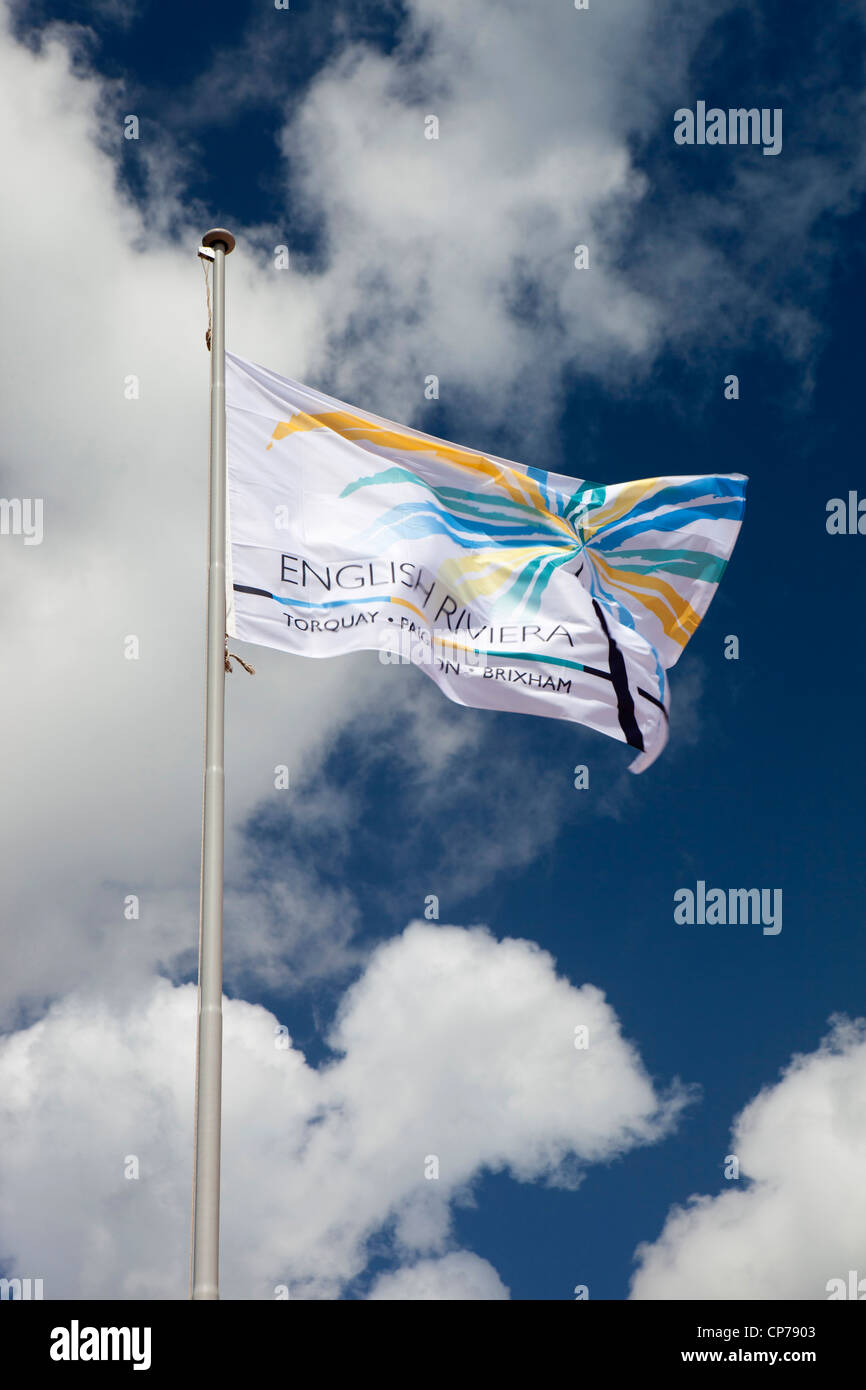 UK, England, Devon, Torquay, Goodrington Sands beach, English Riviera flag flying in blue sky Stock Photo