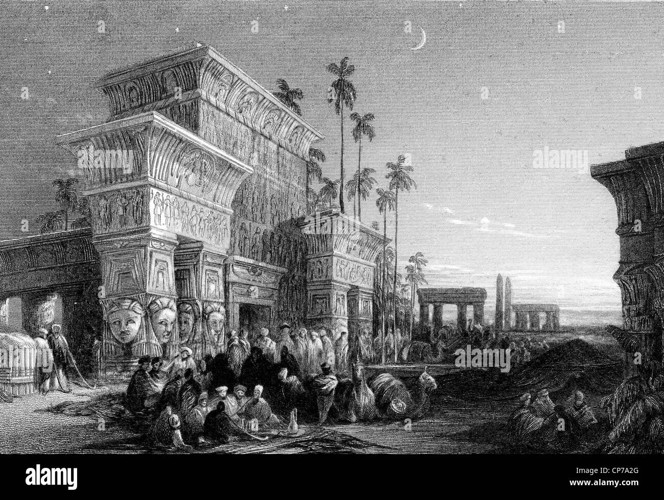 Crowd of Arabs in desert with ancient Egyptian buildings in background under starry sky. Stock Photo