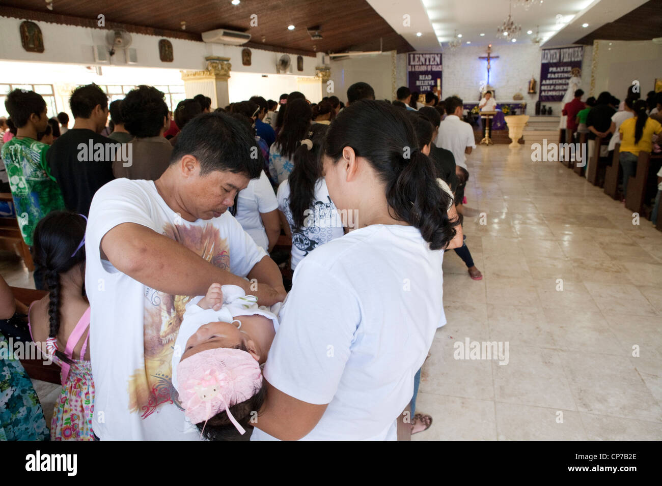 Lapu Lapu City Philippines 26 02 12 0 300 Babies Being Baptised In A Single 3 Hour Ceremony At Mactan Air Base Chapel Stock Photo Alamy