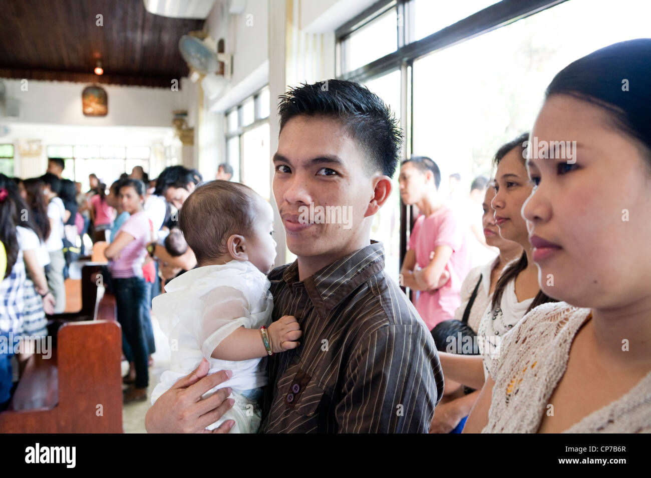 Filipino Family In Church