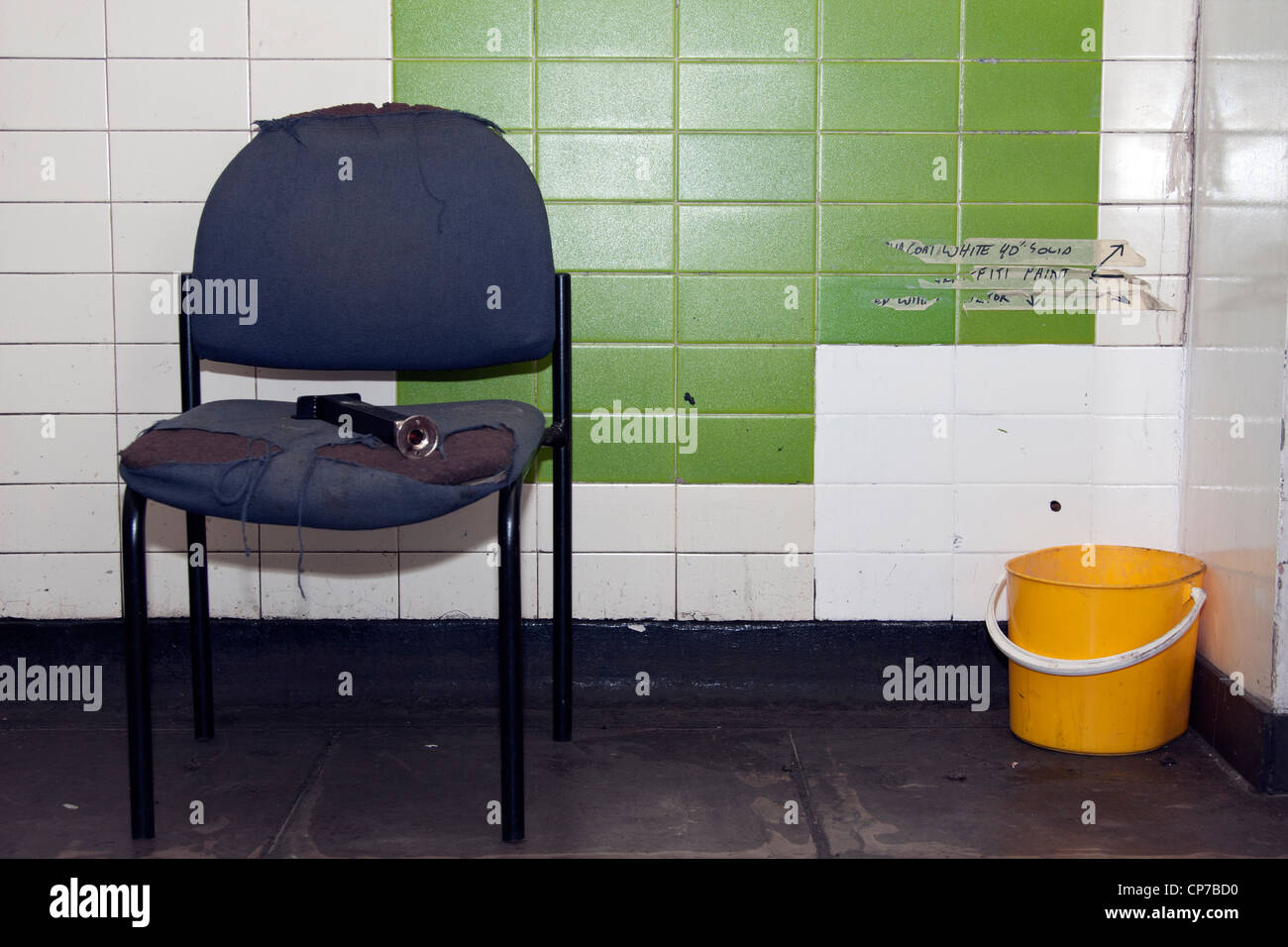 https://c8.alamy.com/comp/CP7BD0/a-deserted-chair-and-a-plastic-bucket-CP7BD0.jpg