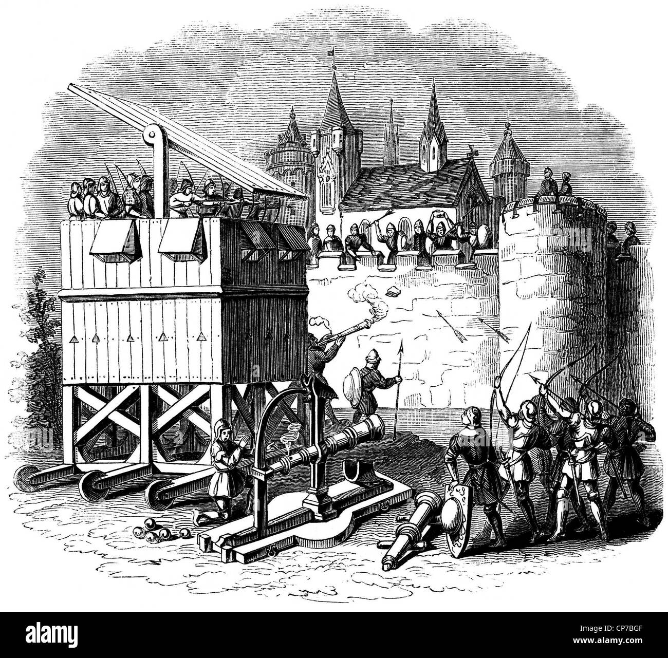 Medieval siege engine tower attacking castle. Stock Photo