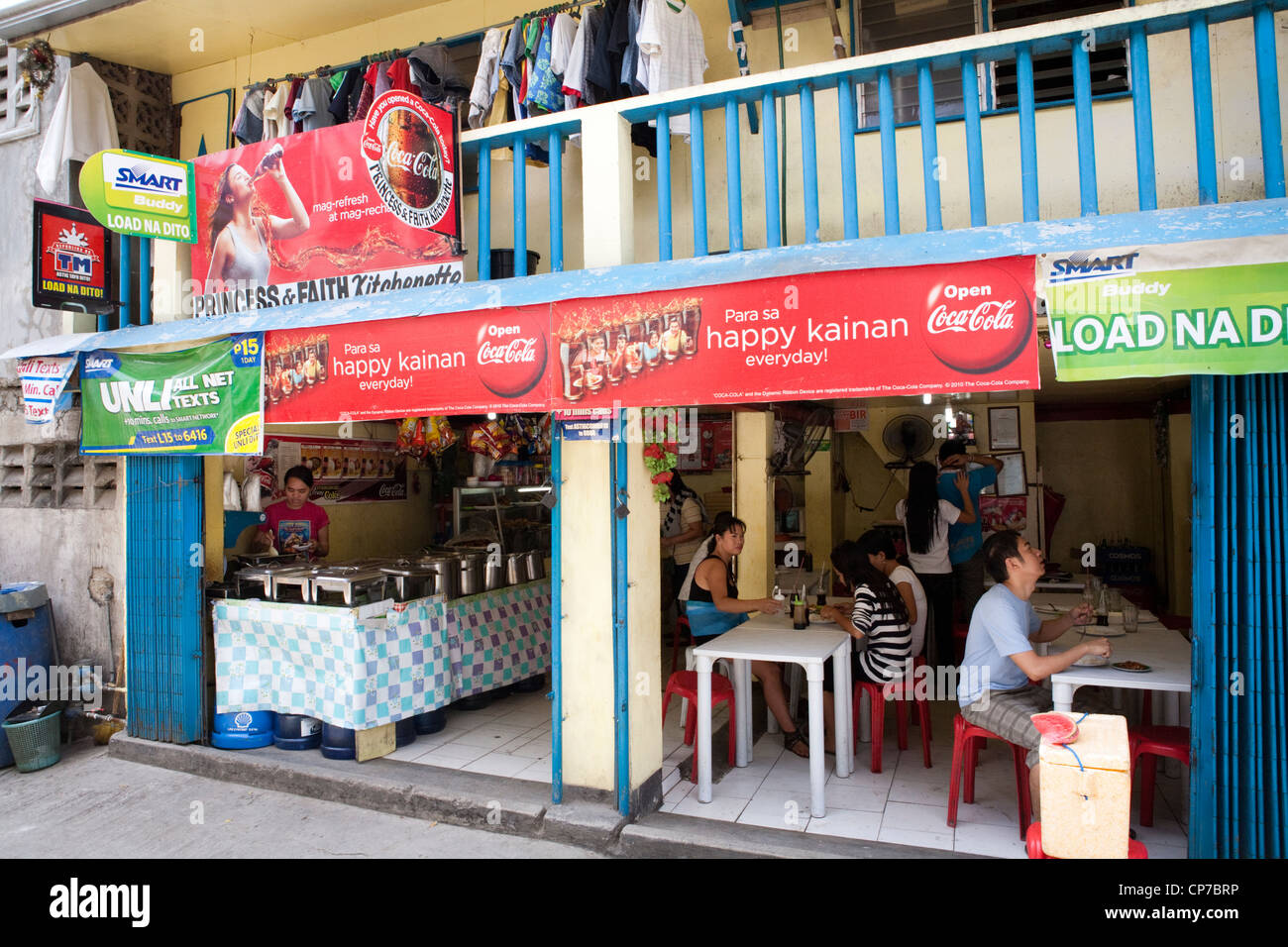 Filipinos eating at a local eatery. Cebu City, Cebu, Visayas, Philippines. Stock Photo